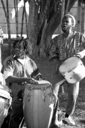 Frederick Massena, left, and Jamail Malcolm X Cesar of the Haitian Rara band Konbo Guinyn performing - Miami, Florida