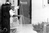 Ada Mickler with one of the cast nets she made in Saint Augustine, Florida.