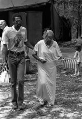 Florida Folklife Program director David Closson with "Diamond Teeth" Mary McClain at the 1982 Florida Folk Festival.