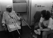 Folklorist Peggy Bulger interviewing "Diamond Teeth" Mary McClain at the Stuffed Pepper in St. Petersburg.