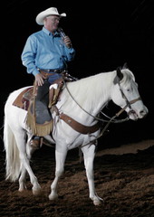 Rodeo announcer Jerry Todd welcoming audience to the Silver Spurs Rodeo in Kissimmee, Florida.