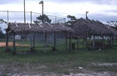 Seminole Indian chickee huts by baseball field at the Big Cypress Indian Reservation