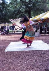 Sisy Abraham performing East Indian dance with Nila Radhakrishnan at the 1991 Florida Folk Festival in White Springs.