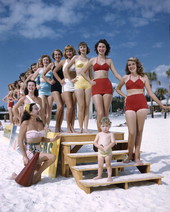 Sarasota Sun-Debs being given lessons in descending stairs at Lido Beach, Florida.