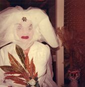 Portrait of a person in costume at a Koreshan Unity Halloween party.