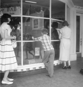 Dixon family members window shopping in Gainesville.