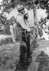 Henry White playing guitar at an Emancipation Day celebration