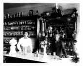 Margaret B. Barry and her son Bill, Sr. at the family drug store, Suwannee Drug Co. - Newberry, Florida