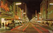 Night activity on Flagler Street, the center of Miami's shopping area.