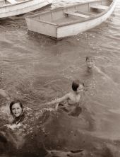 Children swimming in lake - Riviera Beach, Florida.