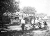 Men and early biplane - Kissimmee, Florida