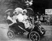 People sitting in a decorated Cadillac - Tampa, Florida.