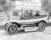 Theo Proctor driving an automobile decorated in support of prohibition - Tallahassee.