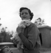 Mrs. Gene Davis holding her cat.