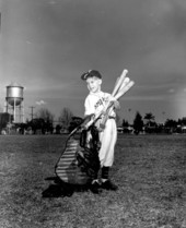 Jimmy "Smoker Jr." Mott, the schools batboy with the equipment - Tampa, Florida