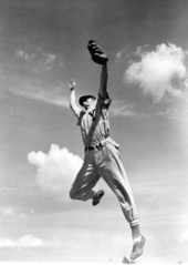 Outfielder Elson Konzen grabs a high one..