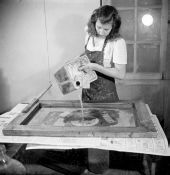 Student silkscreen washing at the NYA's Camp Roosevelt - Ocala, Florida.