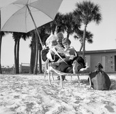 Santa Claus with children at the beach in Saint Petersburg.